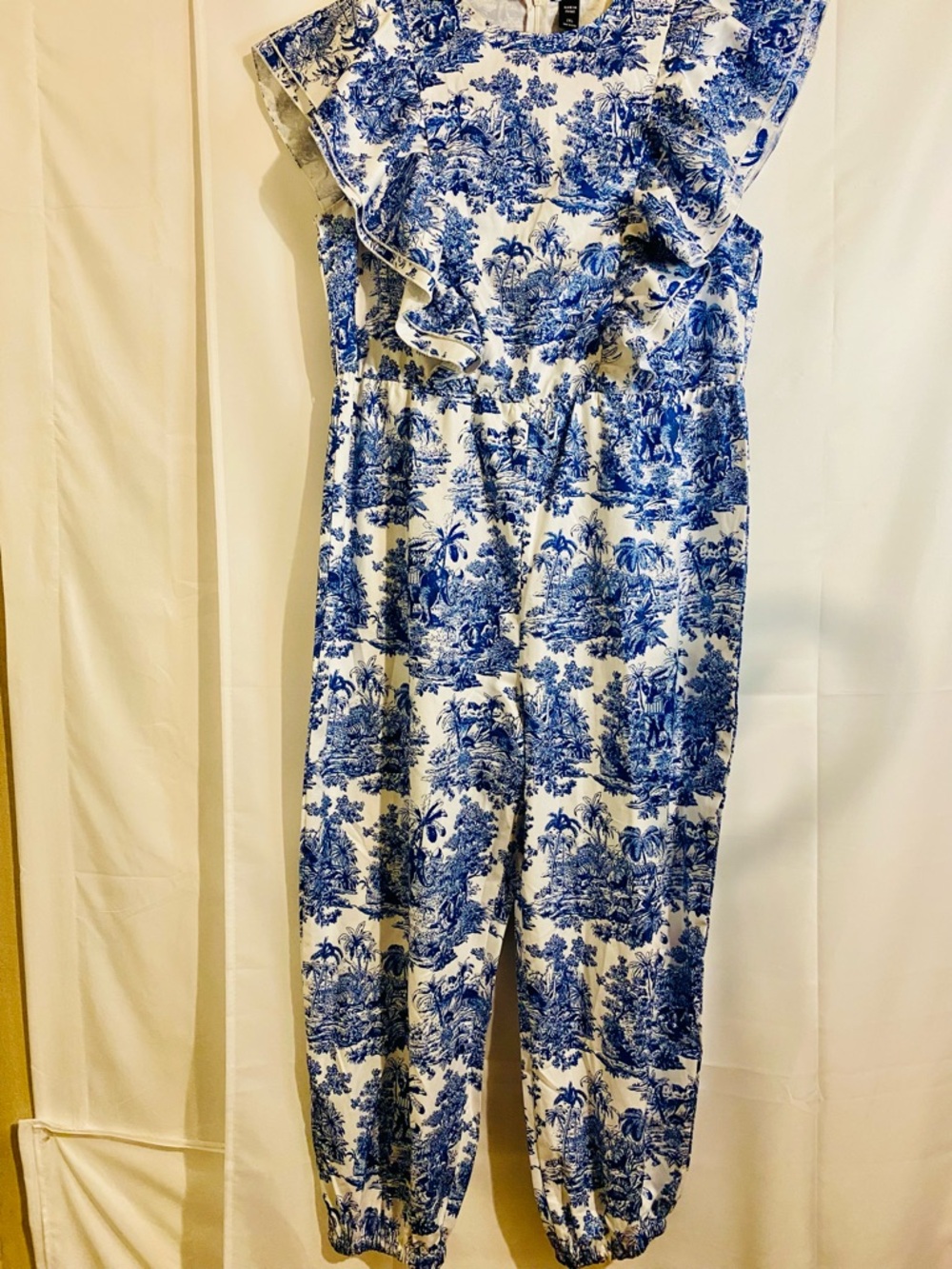 SHEIN Blue and White Ruffled Tropical Print Jumpsuit